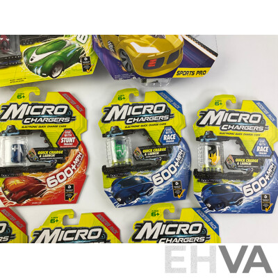 Twelve Boxed Micro Chargers Electronic Quick Charge Cars, Including Three Launcher Packs