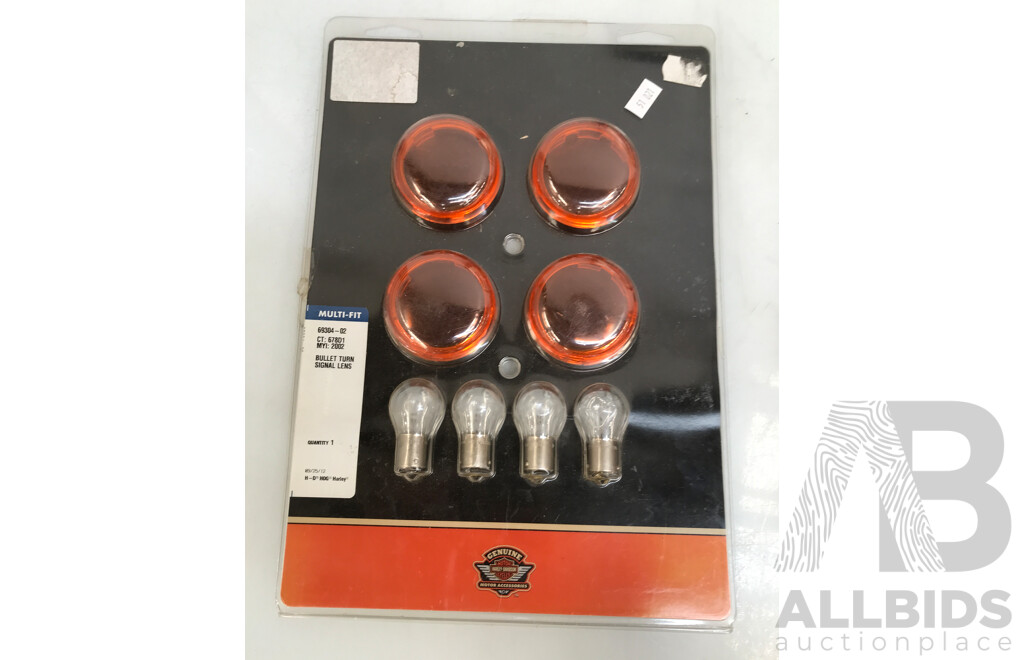 Assorted Harley Davidson Parts and Accessories Including Handlebar, Signal Light Lens, Foot Pegs, and More