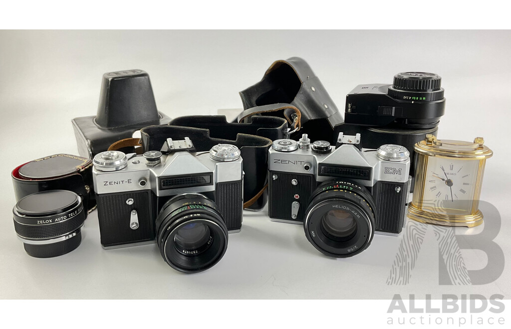Two Vintage Zenit 35mm Cameras, E and EM, Ricoh Flash Lens, Zelox Auto Tele Converter 2 X and Seiko Desk Top Alarm Clock