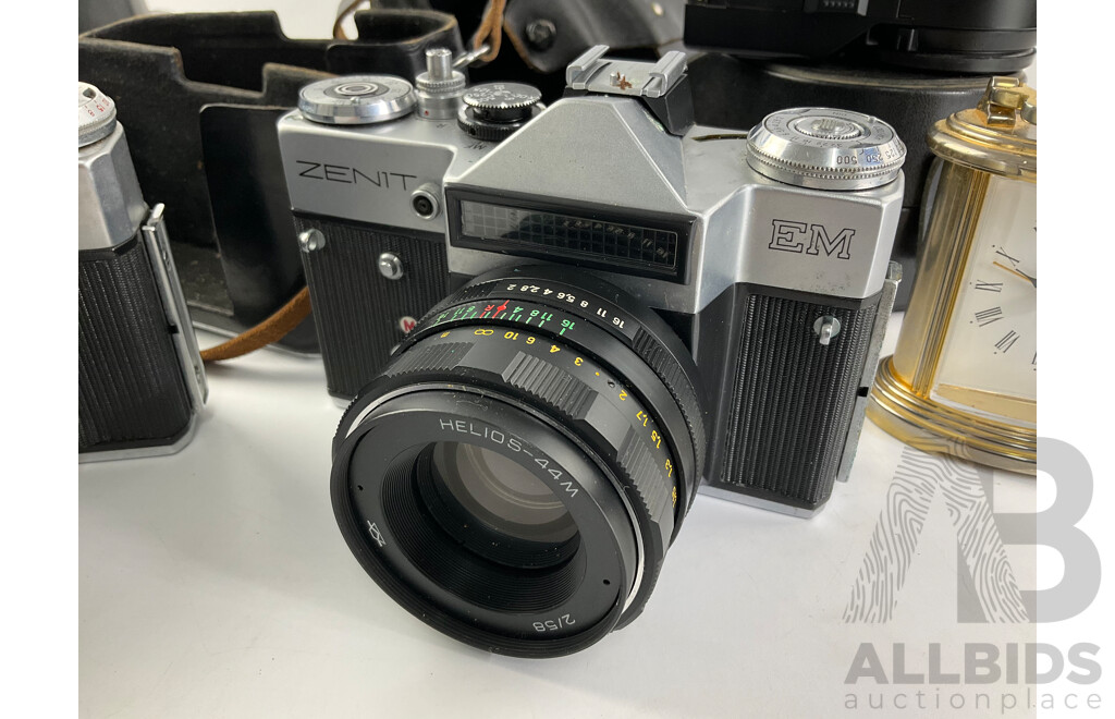 Two Vintage Zenit 35mm Cameras, E and EM, Ricoh Flash Lens, Zelox Auto Tele Converter 2 X and Seiko Desk Top Alarm Clock