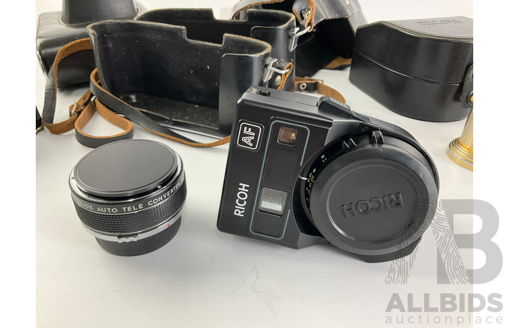 Two Vintage Zenit 35mm Cameras, E and EM, Ricoh Flash Lens, Zelox Auto Tele Converter 2 X and Seiko Desk Top Alarm Clock