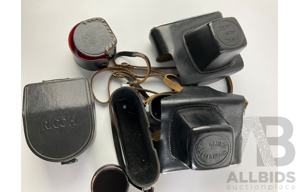 Two Vintage Zenit 35mm Cameras, E and EM, Ricoh Flash Lens, Zelox Auto Tele Converter 2 X and Seiko Desk Top Alarm Clock