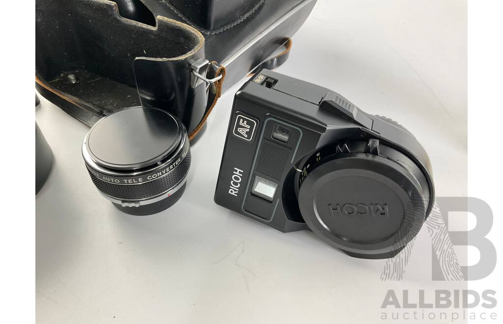 Two Vintage Zenit 35mm Cameras, E and EM, Ricoh Flash Lens, Zelox Auto Tele Converter 2 X and Seiko Desk Top Alarm Clock