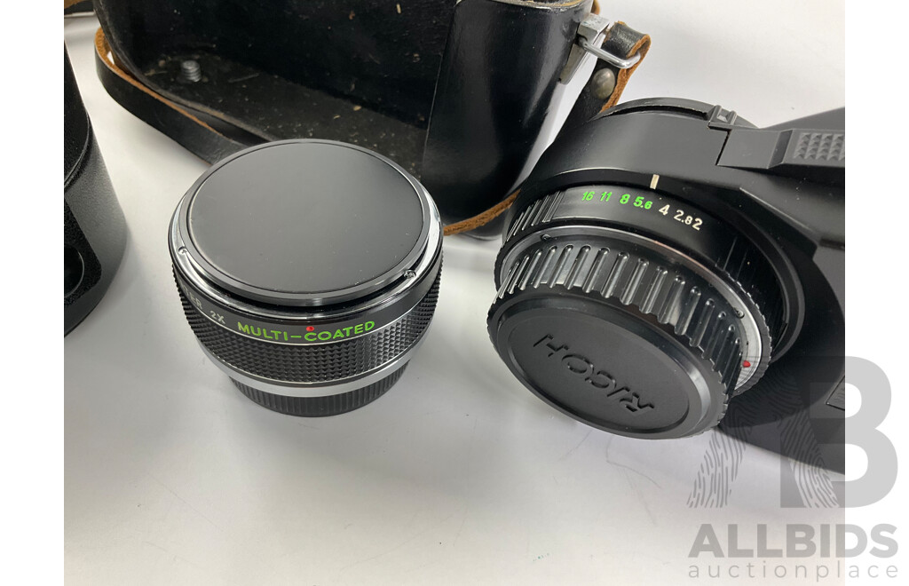 Two Vintage Zenit 35mm Cameras, E and EM, Ricoh Flash Lens, Zelox Auto Tele Converter 2 X and Seiko Desk Top Alarm Clock