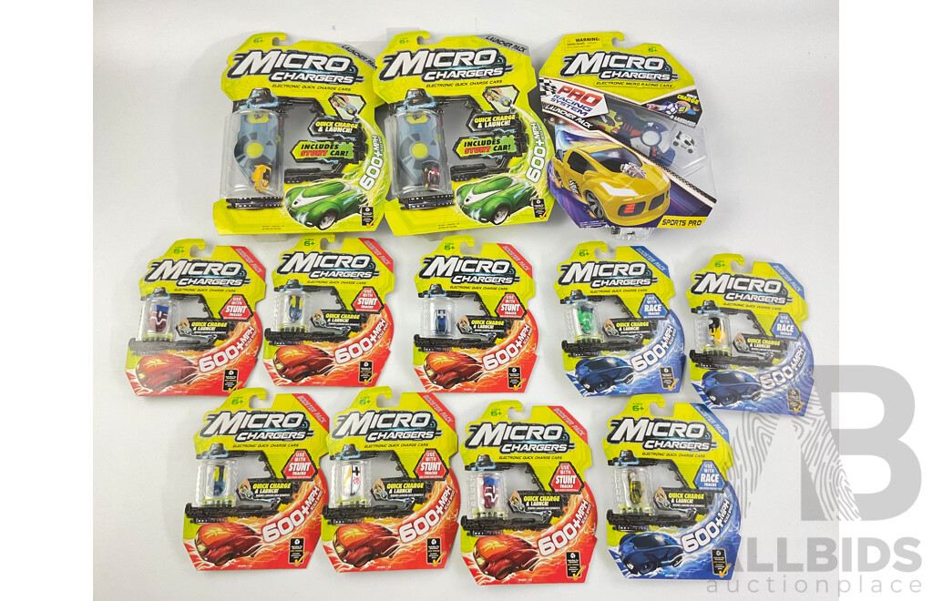 Twelve Boxed Micro Chargers Electronic Quick Charge Cars, Including Three Launcher Packs
