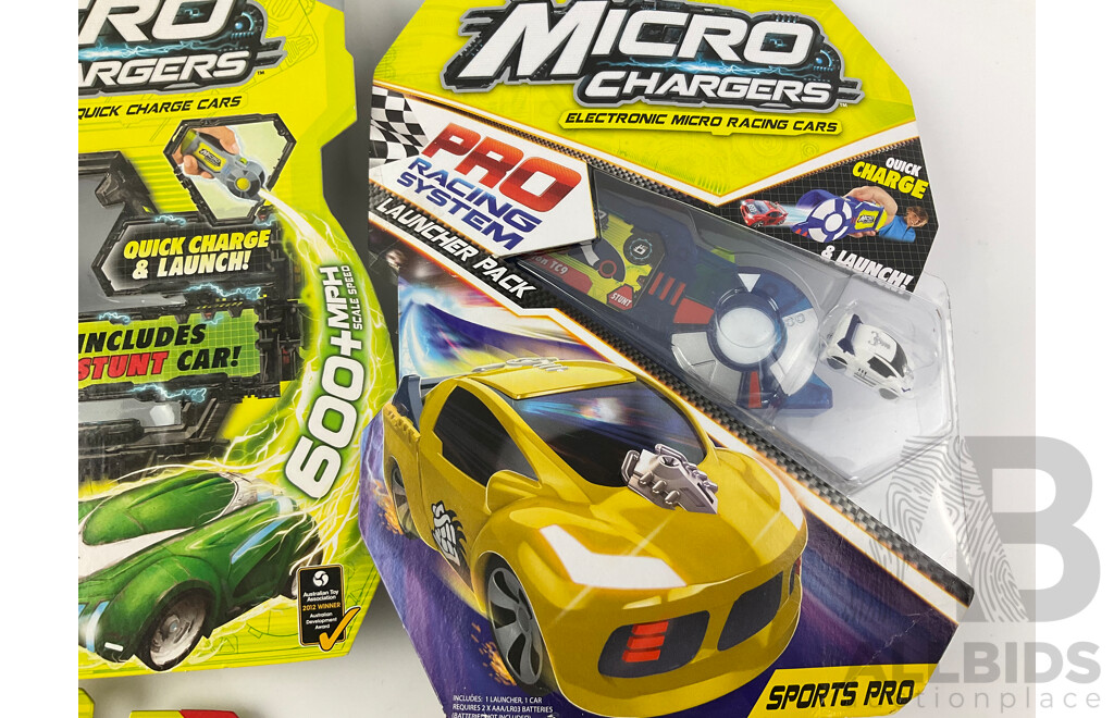 Twelve Boxed Micro Chargers Electronic Quick Charge Cars, Including Three Launcher Packs