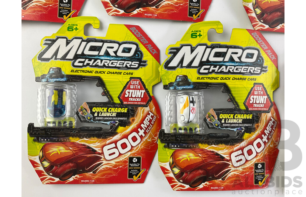 Twelve Boxed Micro Chargers Electronic Quick Charge Cars, Including Three Launcher Packs