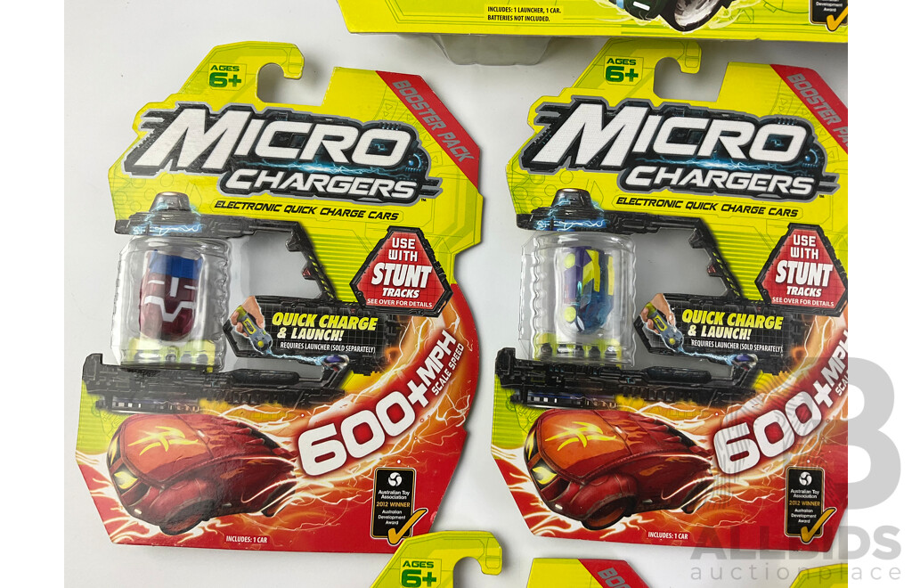 Twelve Boxed Micro Chargers Electronic Quick Charge Cars, Including Three Launcher Packs