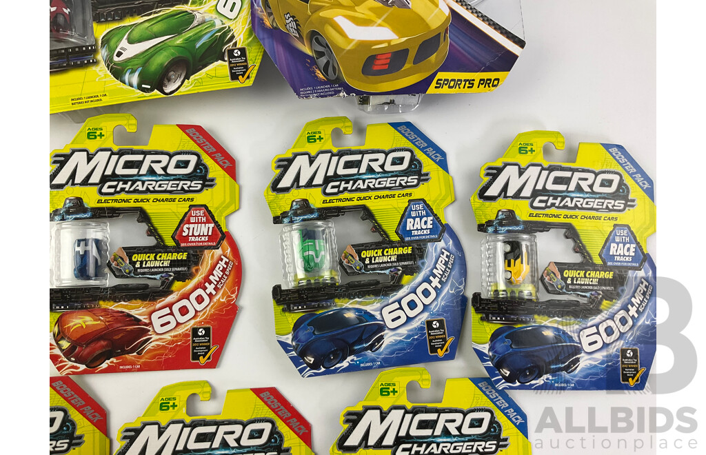 Twelve Boxed Micro Chargers Electronic Quick Charge Cars, Including Three Launcher Packs
