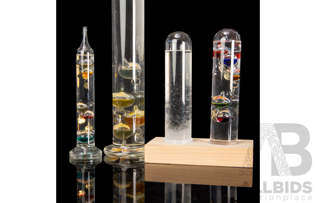 Collection Galileo Thermometers. One with Admiral Fitzroy Storm Glass