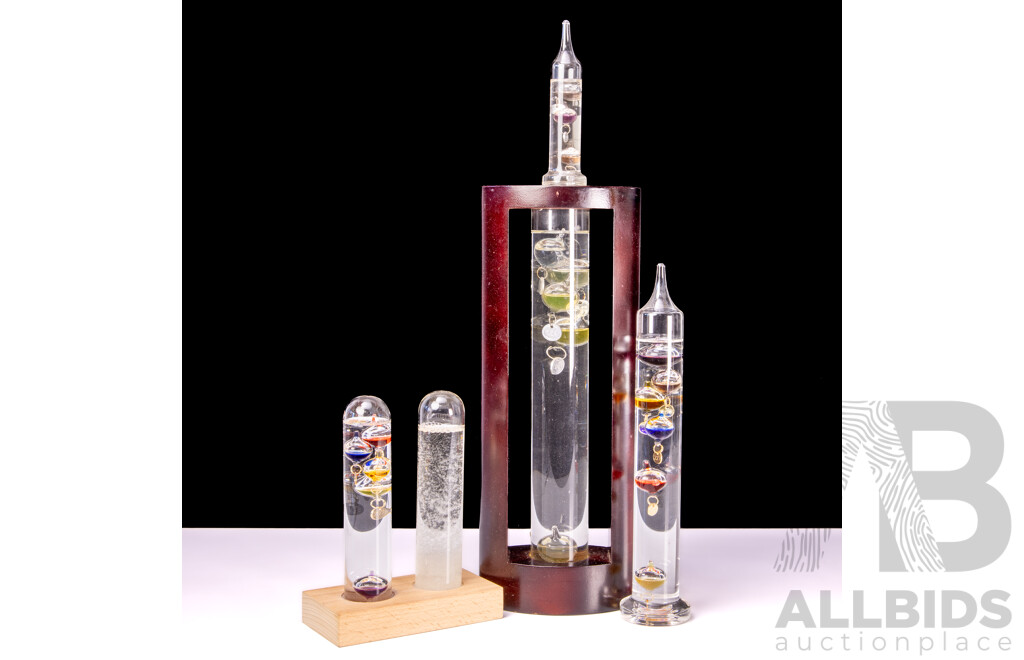 Collection Galileo Thermometers. One with Admiral Fitroys Storm Glass