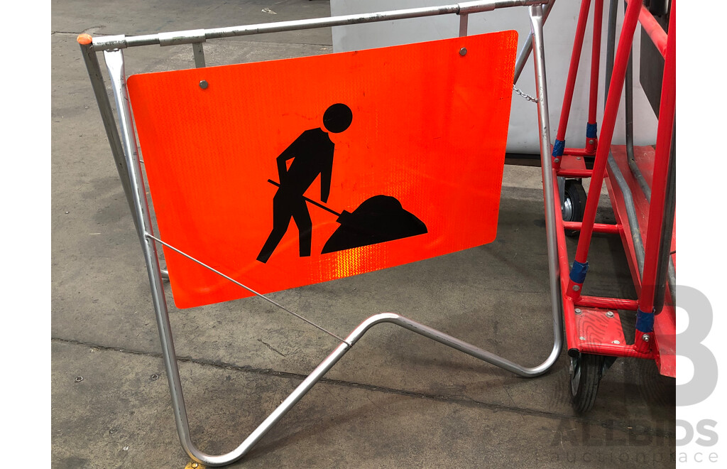 Four Worksite A-Frames, Two Men at Work Signs and Two Trolleys