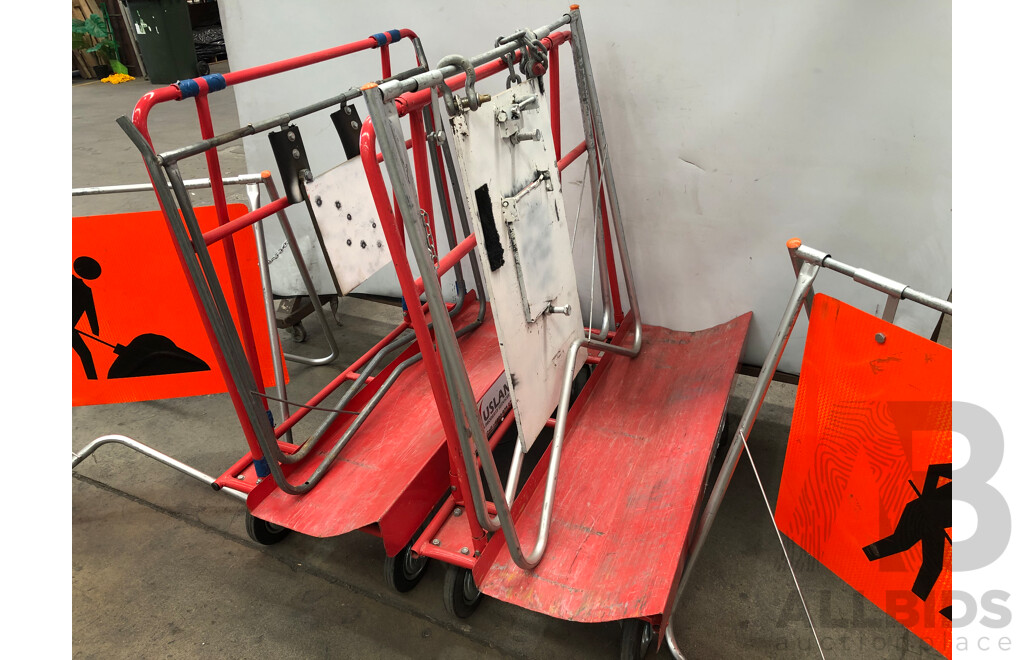Four Worksite A-Frames, Two Men at Work Signs and Two Trolleys