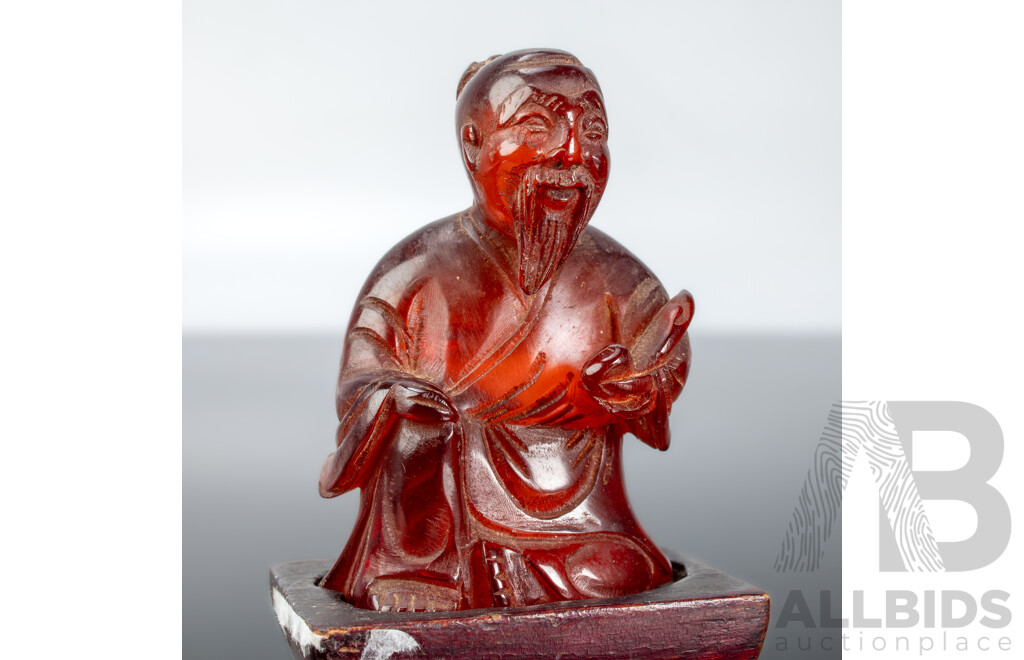Rare Antique Chinese Carved Red Amber Figure with Pipe on Wooden Stand