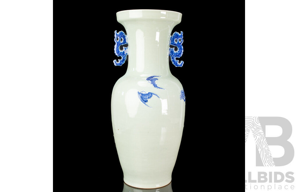 Large Vintage Chinese Porcelain Vase with Twin Lion Dog Form Handles and Body with Raised Blue and White Lion Dog and Eagle Scene with Auspicious Bats to Reverse Side