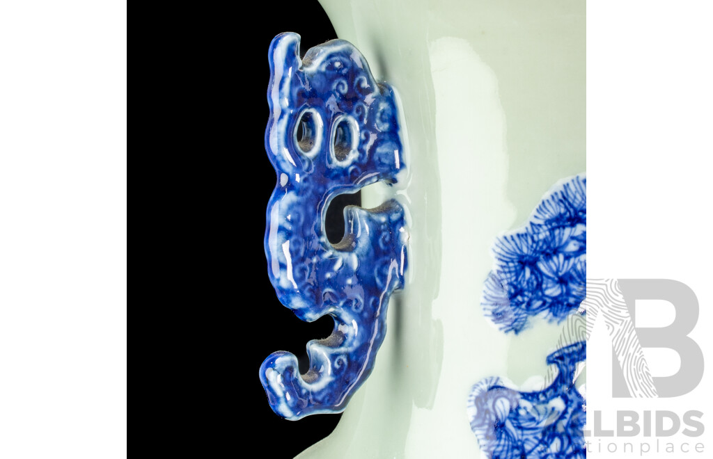 Large Vintage Chinese Porcelain Vase with Twin Lion Dog Form Handles and Body with Raised Blue and White Lion Dog and Eagle Scene with Auspicious Bats to Reverse Side