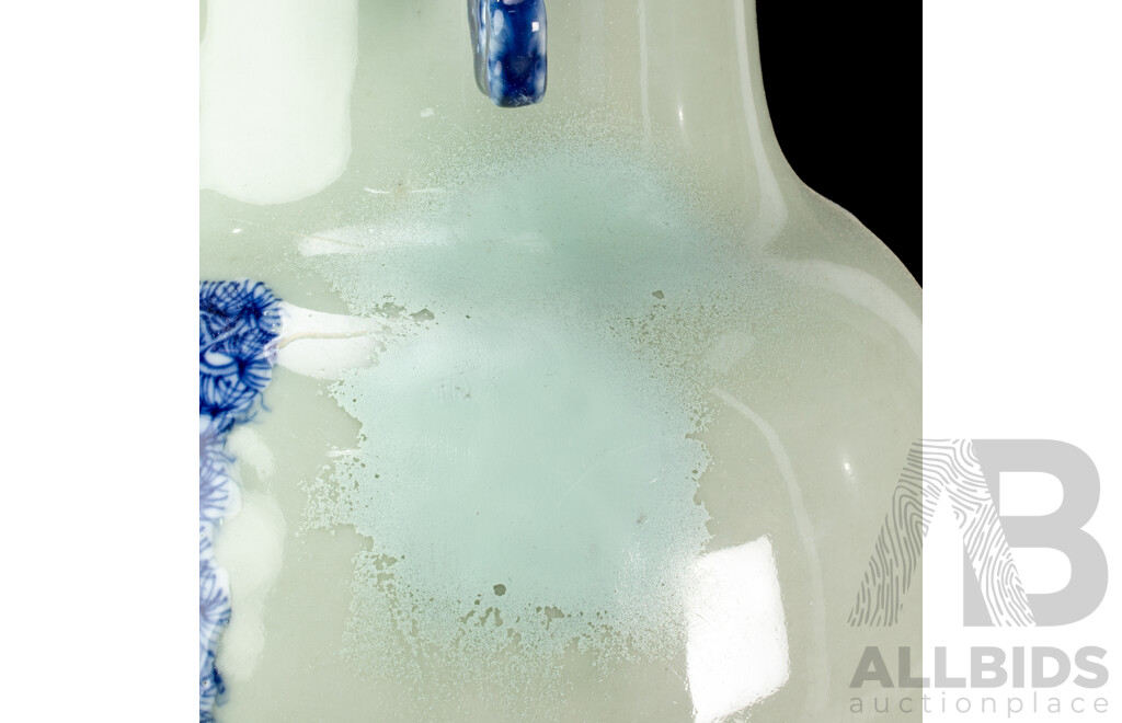 Large Vintage Chinese Porcelain Vase with Twin Lion Dog Form Handles and Body with Raised Blue and White Lion Dog and Eagle Scene with Auspicious Bats to Reverse Side