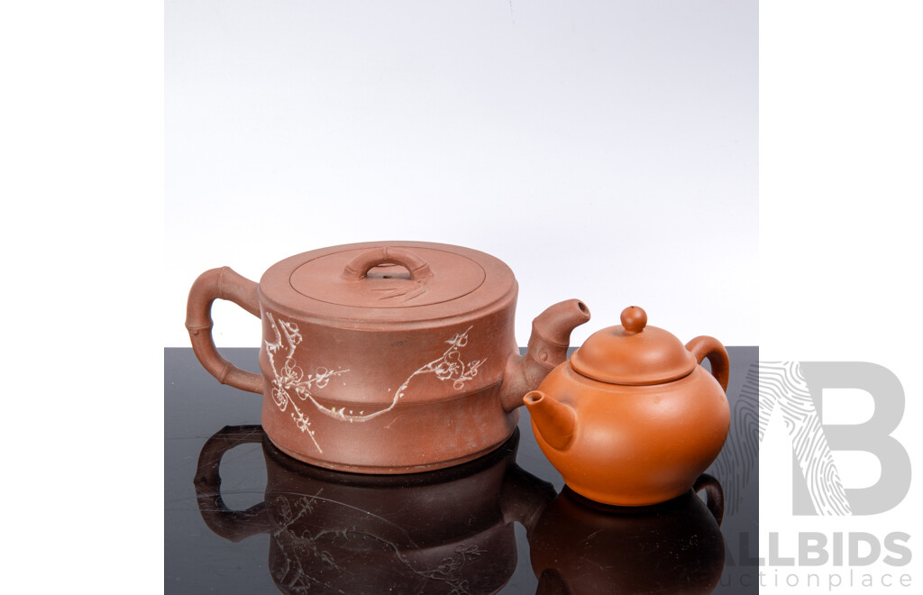 Vintage Chinese Yi Xing Pottery Lidded Teapot with Branch Form Handles and Cherry Blossom Motif to Side Along with Another Example