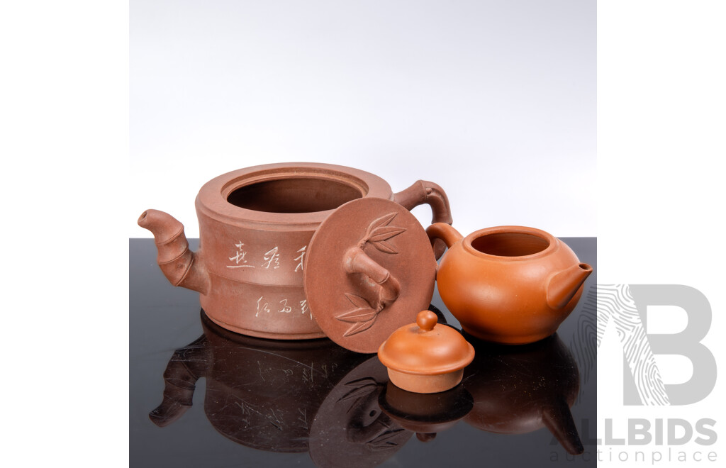 Vintage Chinese Yi Xing Pottery Lidded Teapot with Branch Form Handles and Cherry Blossom Motif to Side Along with Another Example