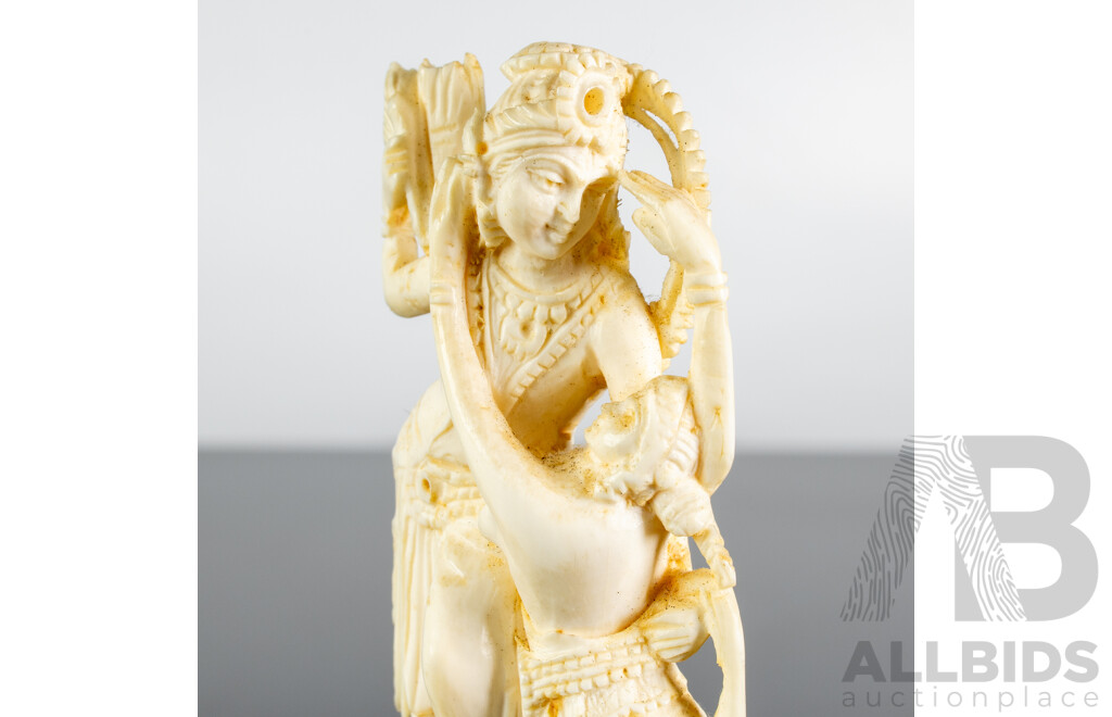 Antique Indian Hand Carved Ivory Figure of Krishna in Amorous Mood on Wooden Stand