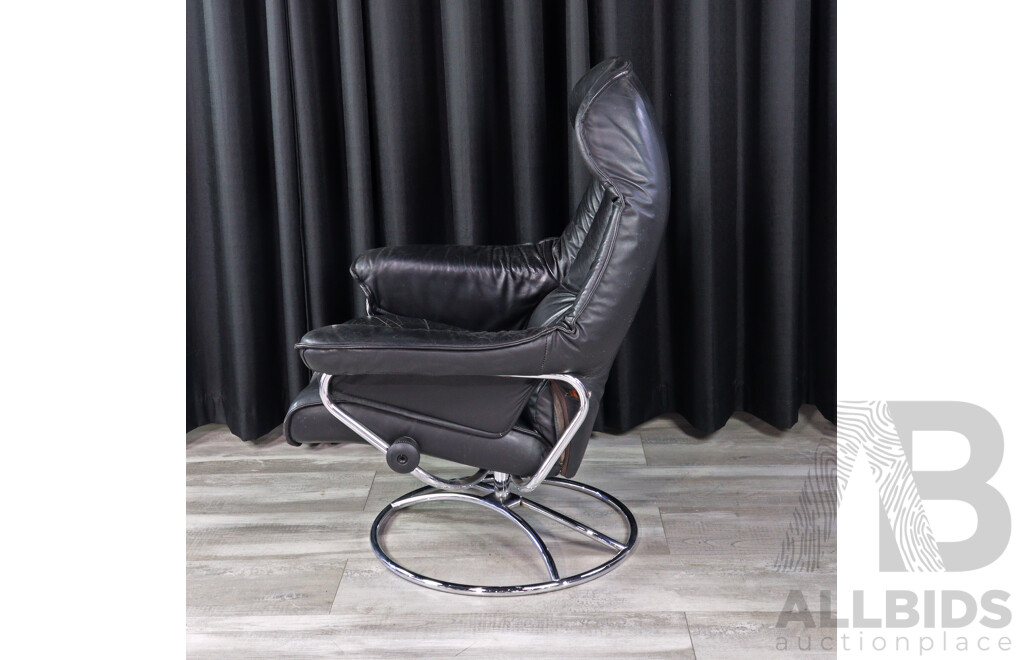 Vintage Leather Swivel Lounge Chair and Ottoman by Stressless