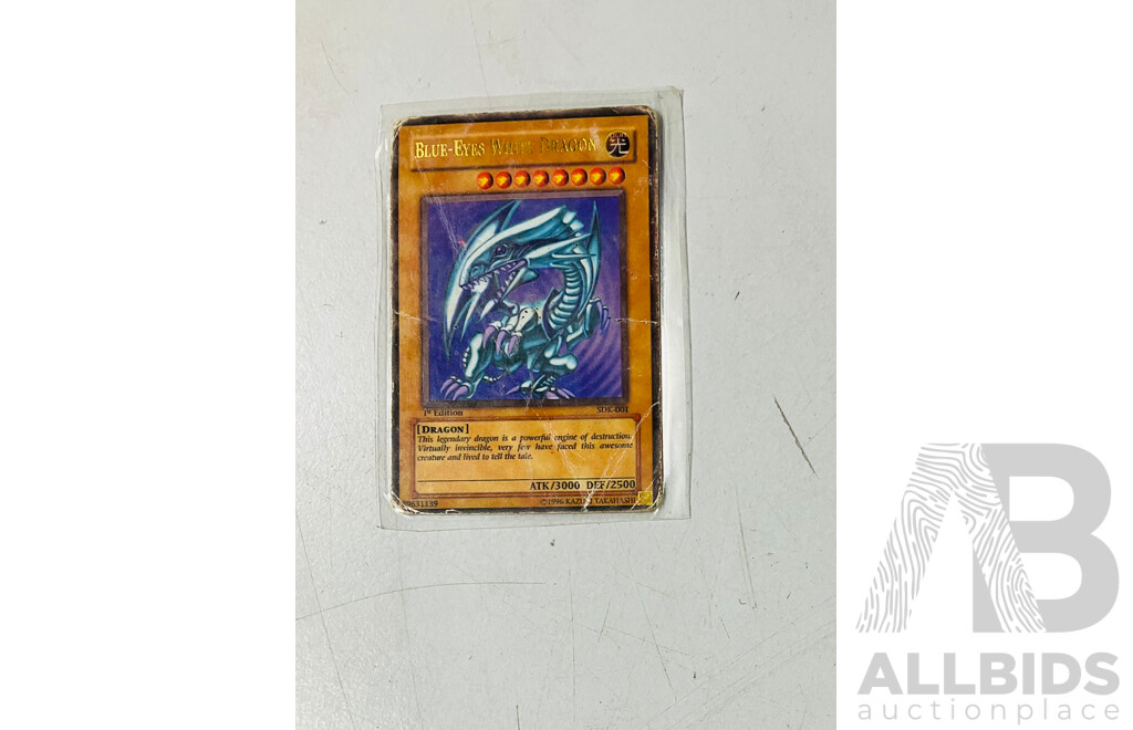 Collection of Yu-Gi-Oh and Duel Master’s Cards Including Heavily Played Blue-eyes White Dragon and Foil Dark Magician