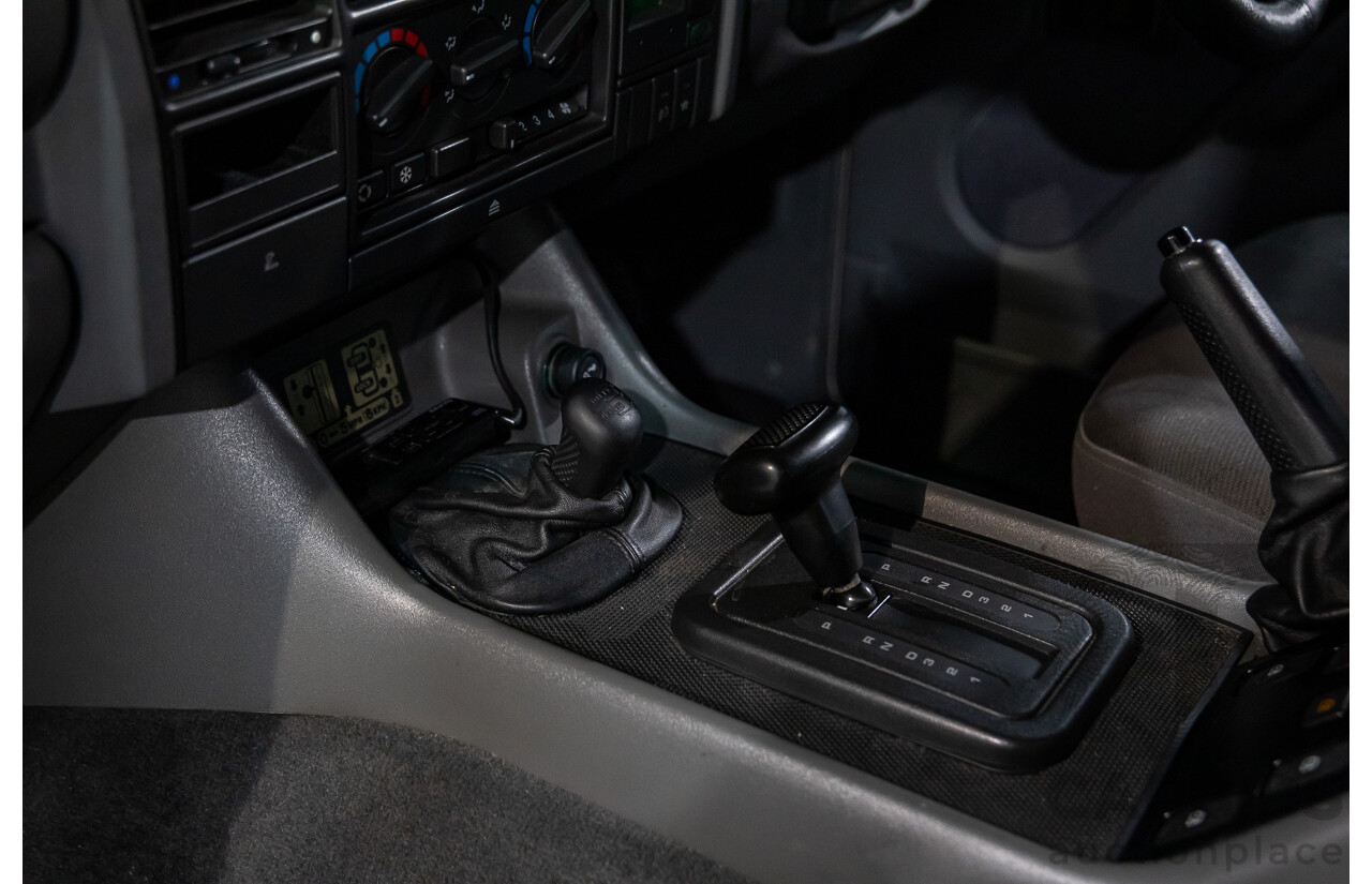 6/1999 Land Rover Discovery SE7 (4x4) 4d Wagon White V8 4.0L