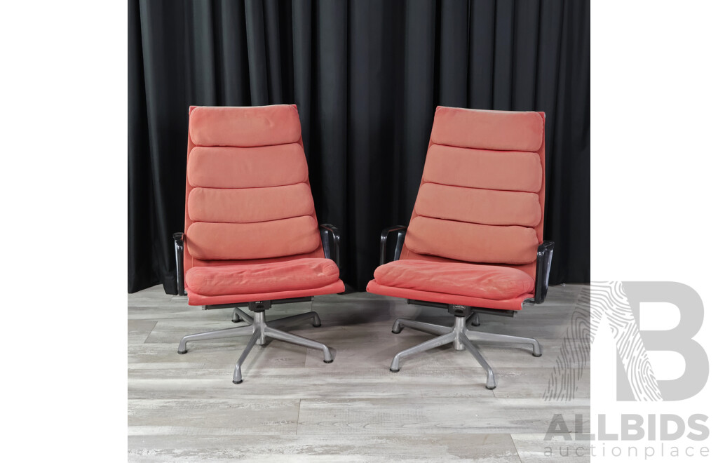 Pair of Herman Millers Eames Soft Pad Swivel Arm Chairs