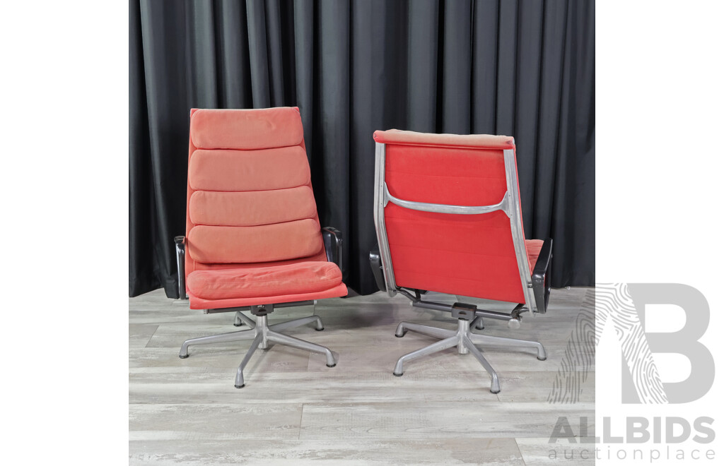 Pair of Herman Millers Eames Soft Pad Swivel Arm Chairs
