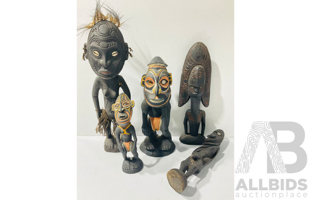 Collection Five Hand Carved Papua New Guinea Wooden Figures with Incised Detail