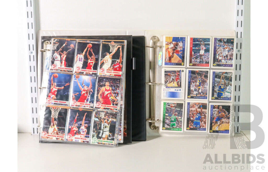 Two Albums of 1993/94 NBA Hoops and Upper Deck Collector Cards Including Dennis Robinson, Charles Barkley, Alonzo Mourning, Chris Webber, Scottie Pippen, Anfernee Hardaway, Dominique Wilkins, Joe Dumas, Dikembe Mutombo, Latrell Sprewell and More
