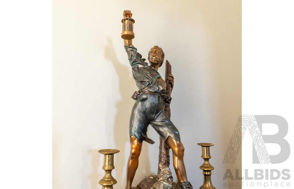 Reproduction Spelter Détresse Figure with Two Brass Candlesticks