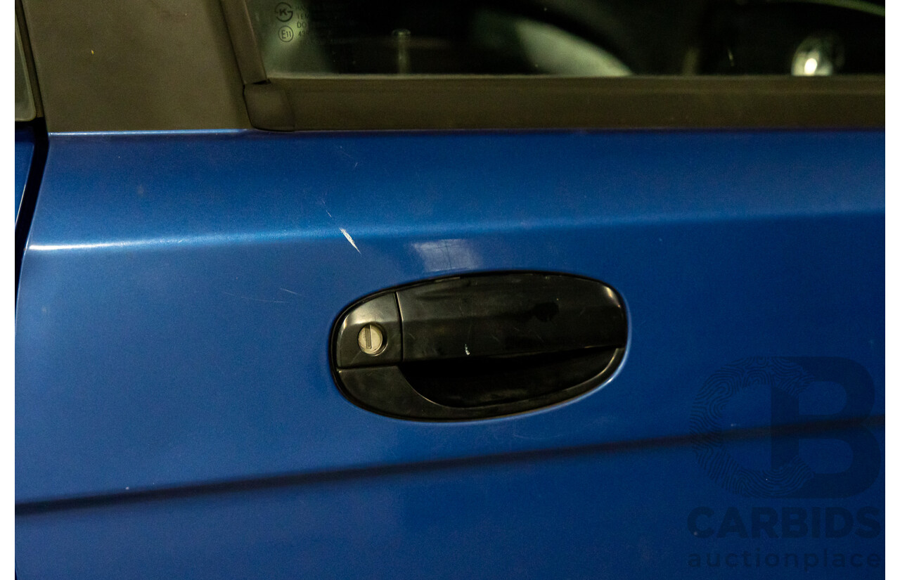 11/2008 Holden Barina  TK MY09 3d Hatchback Horizon Blue 1.6L