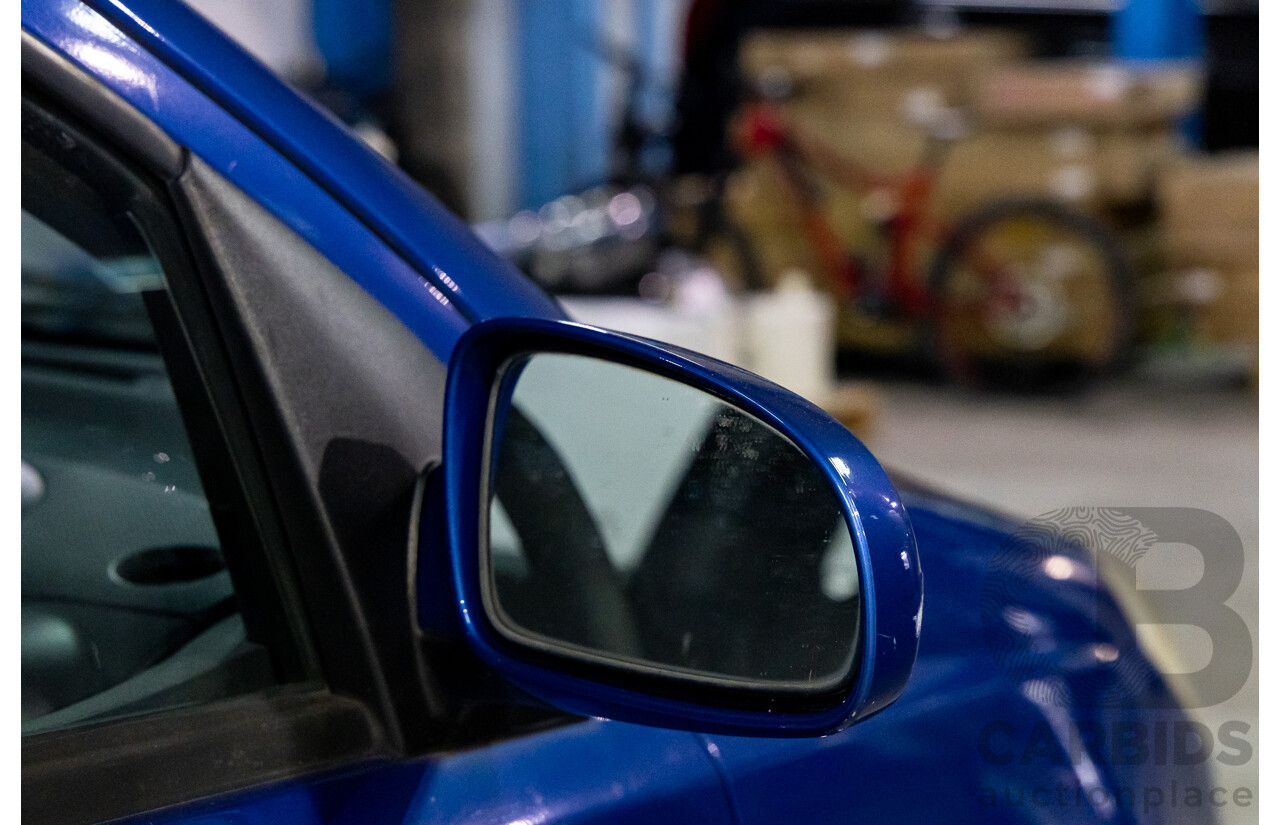 11/2008 Holden Barina  TK MY09 3d Hatchback Horizon Blue 1.6L