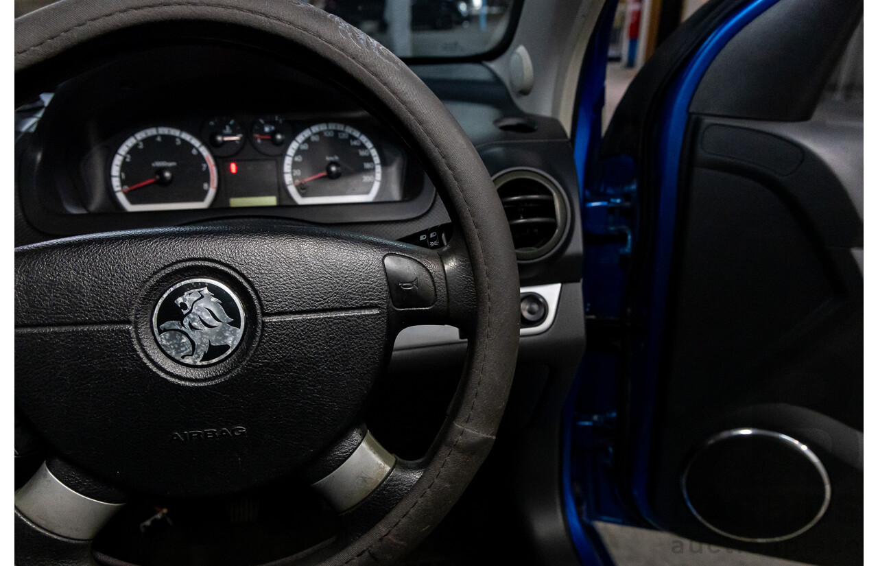 11/2008 Holden Barina  TK MY09 3d Hatchback Horizon Blue 1.6L