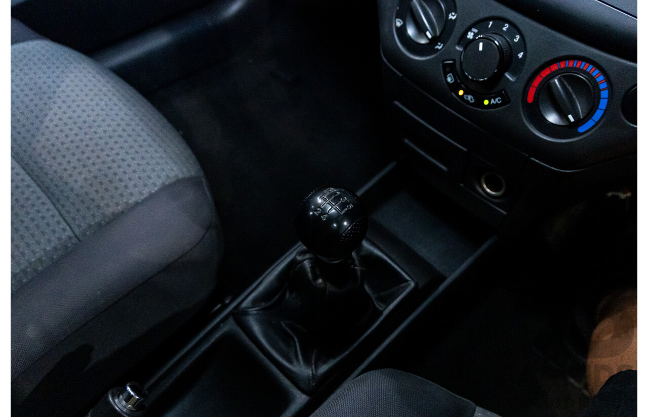 11/2008 Holden Barina  TK MY09 3d Hatchback Horizon Blue 1.6L