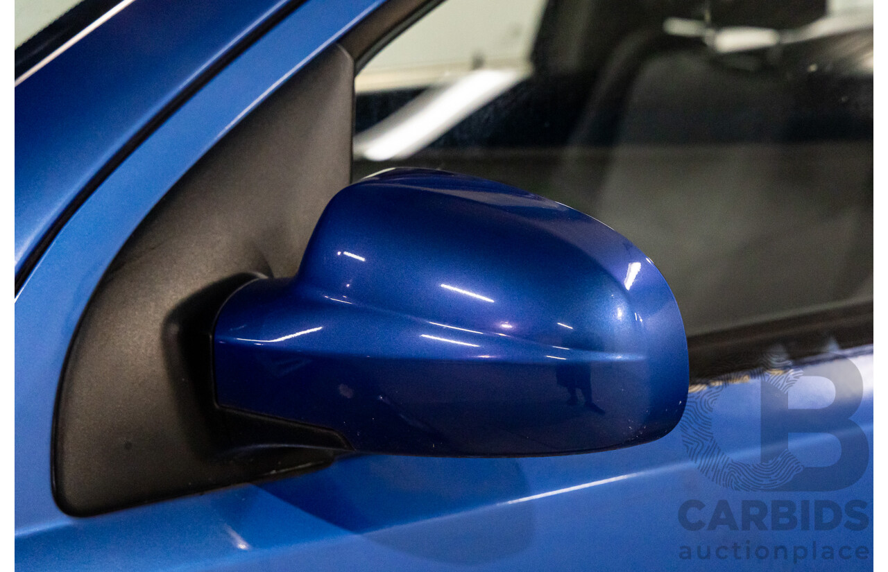 11/2008 Holden Barina  TK MY09 3d Hatchback Horizon Blue 1.6L