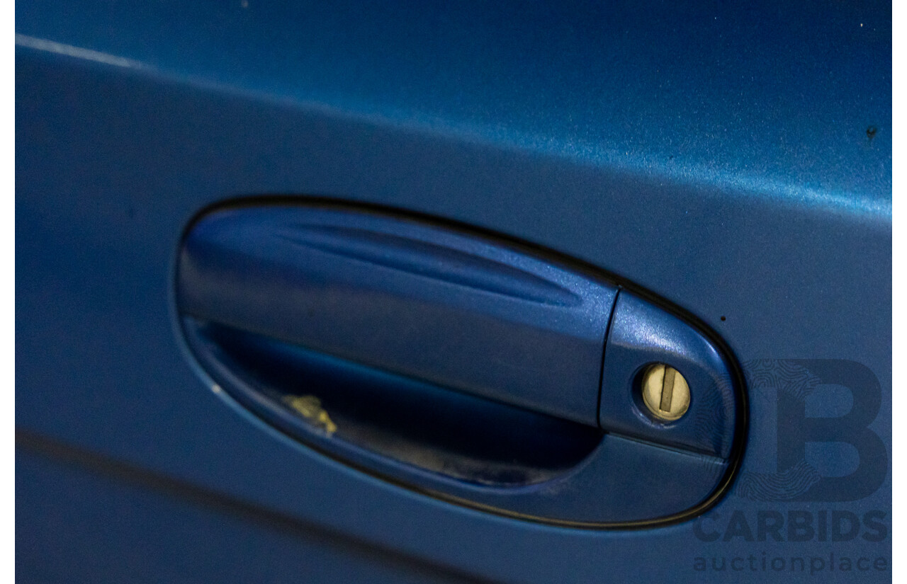 11/2008 Holden Barina  TK MY09 3d Hatchback Horizon Blue 1.6L