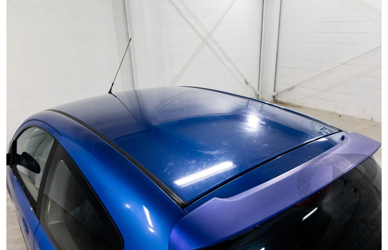 11/2008 Holden Barina  TK MY09 3d Hatchback Horizon Blue 1.6L