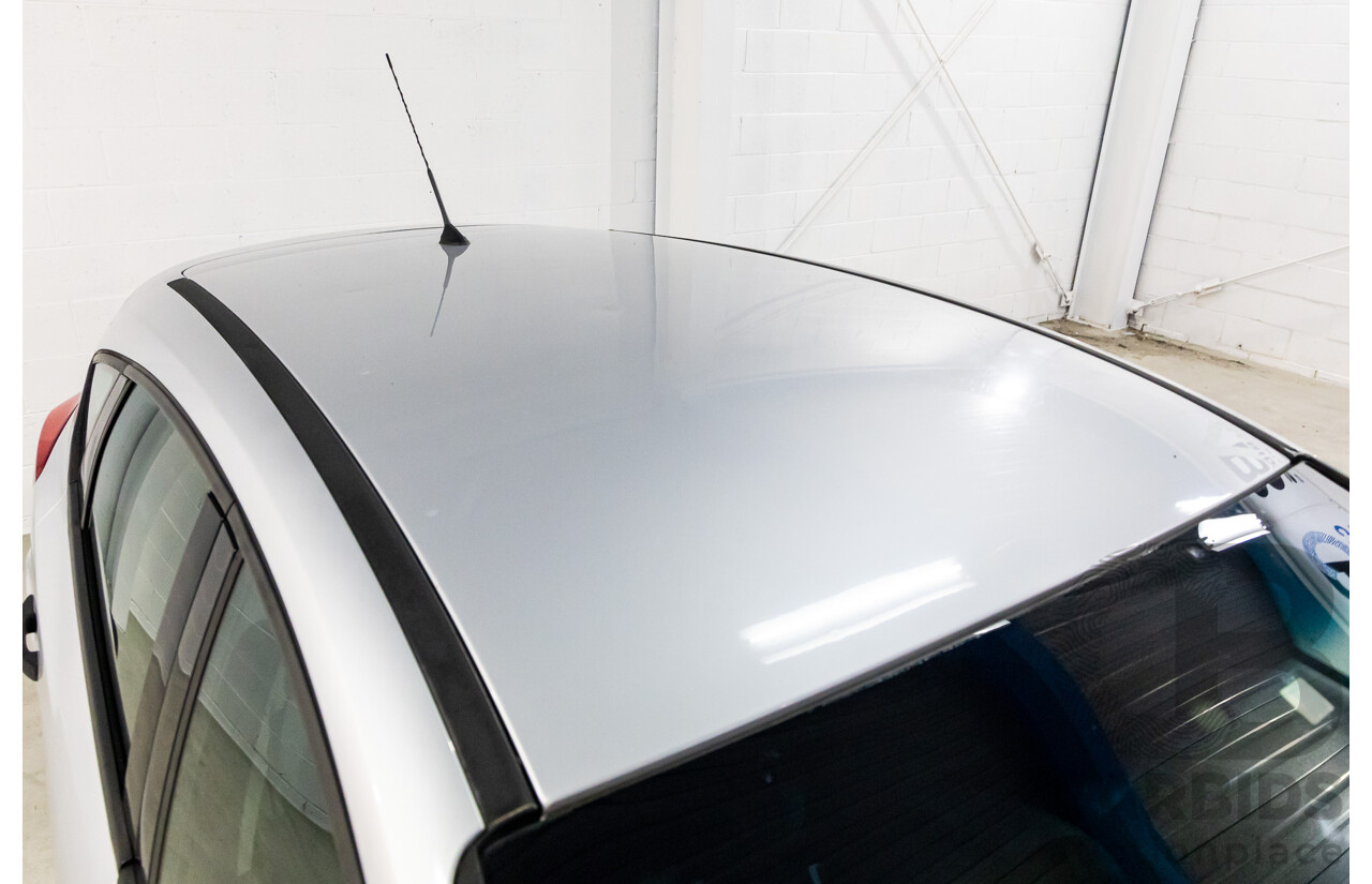 7/2012 Ford Focus Ambiente LW 5d Hatchback Ingot Silver Metallic 1.6L