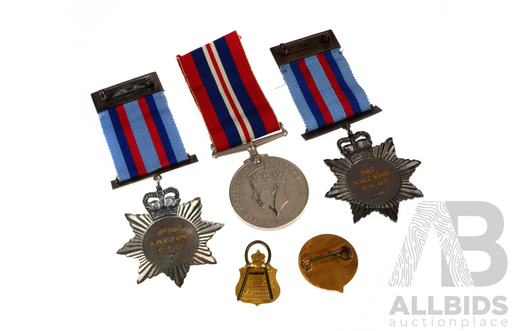 British World War Two Service Medal with Corps of Commissionaires Awards of Merit, A.W.C Sims, 1967 and 1972