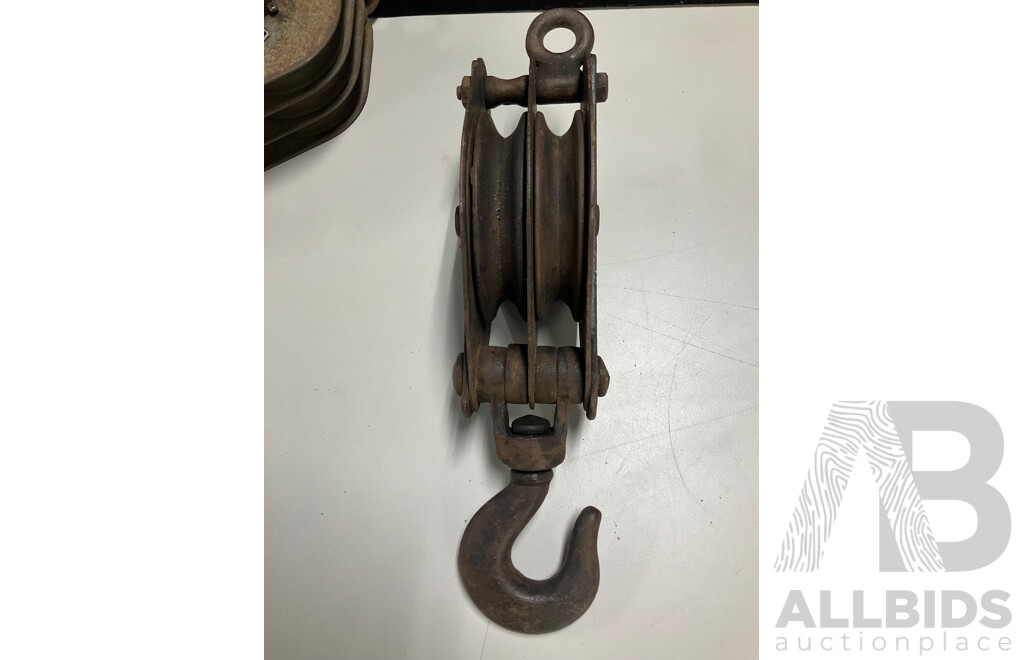 Two Iron Pulley Hooks Including Richard Russell & Sons