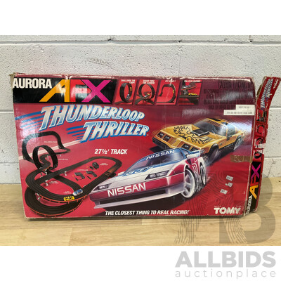 A Tomy Aurora AFX Daredevil Rally slot racing game