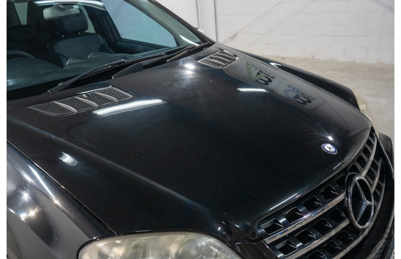 11/2009 Mercedes-Benz ML 300 CDI AMG Sports (4x4) W164 09 UPGRADE 4d Wagon Obsidian Black Metalic Turbo Diesel V6 3.0L
