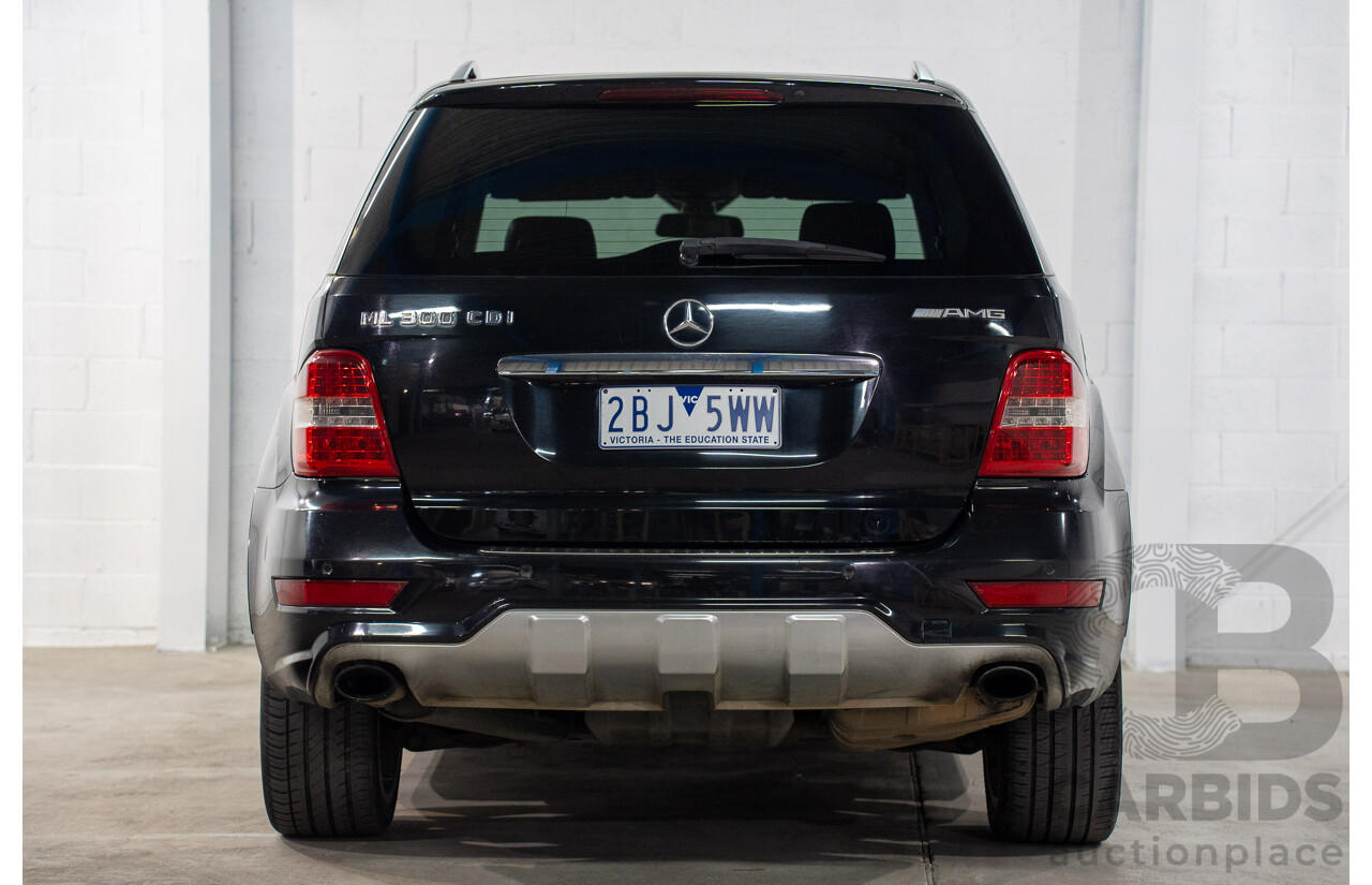 11/2009 Mercedes-Benz ML 300 CDI AMG Sports (4x4) W164 09 UPGRADE 4d Wagon Obsidian Black Metalic Turbo Diesel V6 3.0L
