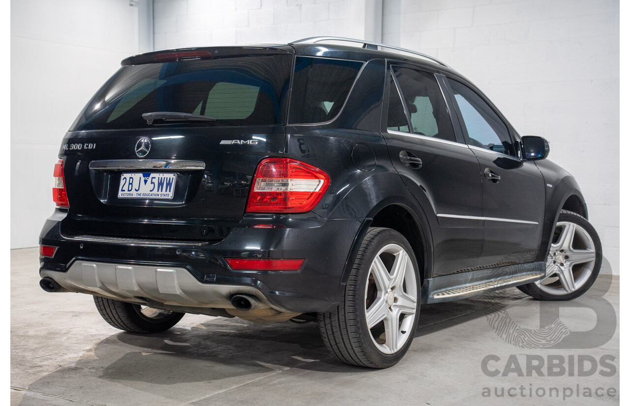 11/2009 Mercedes-Benz ML 300 CDI AMG Sports (4x4) W164 09 UPGRADE 4d Wagon Obsidian Black Metalic Turbo Diesel V6 3.0L