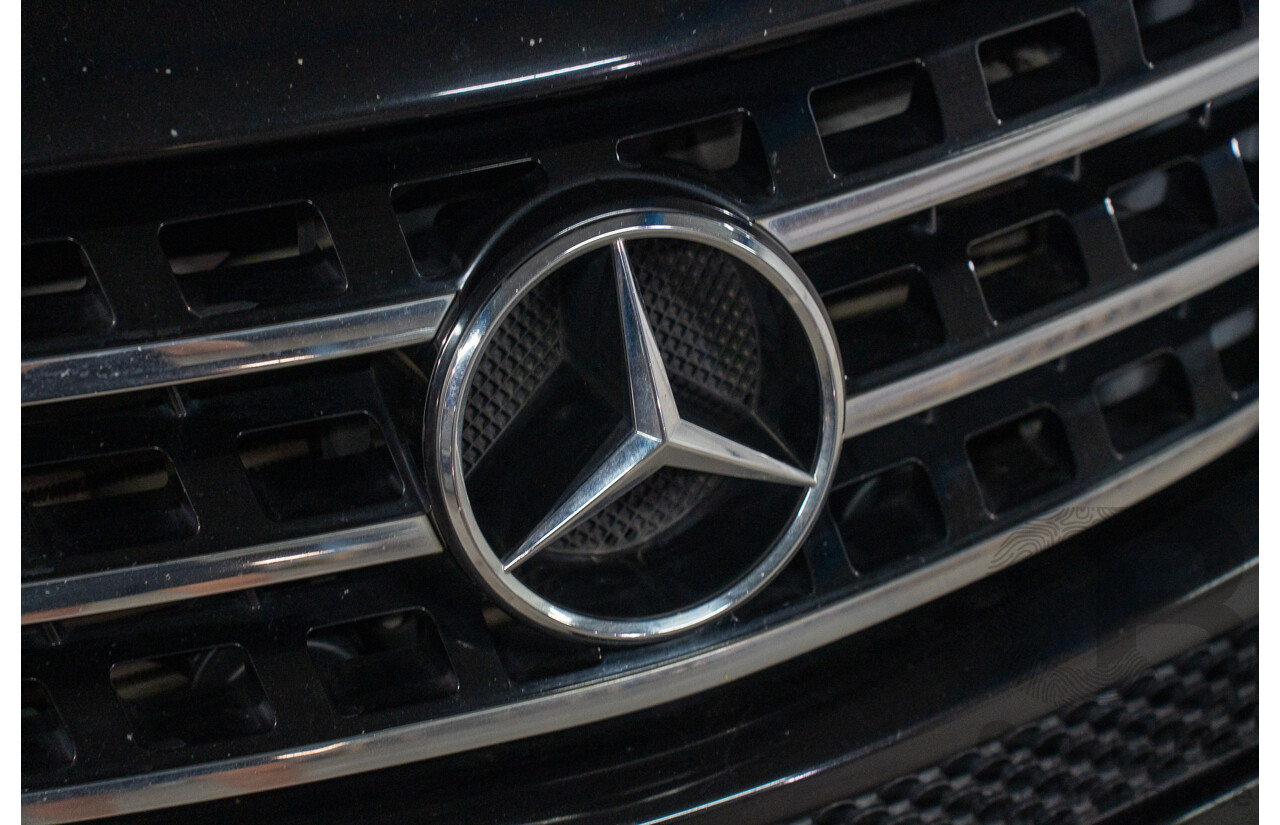 11/2009 Mercedes-Benz ML 300 CDI AMG Sports (4x4) W164 09 UPGRADE 4d Wagon Obsidian Black Metalic Turbo Diesel V6 3.0L