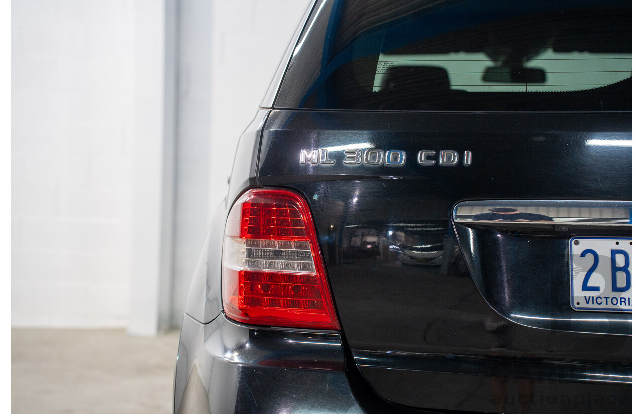 11/2009 Mercedes-Benz ML 300 CDI AMG Sports (4x4) W164 09 UPGRADE 4d Wagon Obsidian Black Metalic Turbo Diesel V6 3.0L
