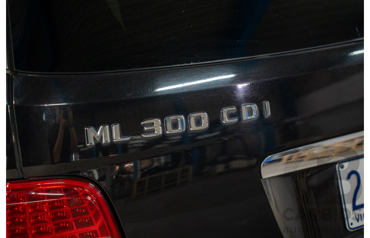 11/2009 Mercedes-Benz ML 300 CDI AMG Sports (4x4) W164 09 UPGRADE 4d Wagon Obsidian Black Metalic Turbo Diesel V6 3.0L