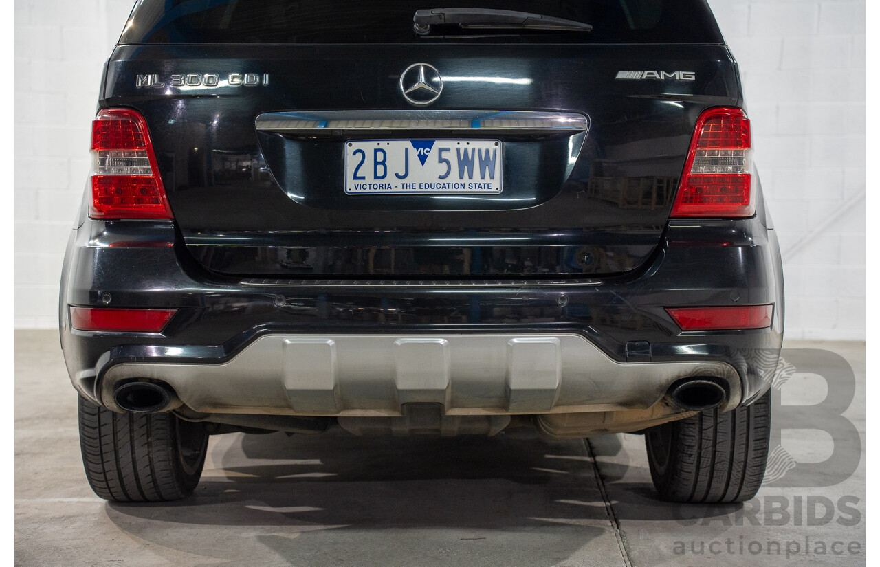 11/2009 Mercedes-Benz ML 300 CDI AMG Sports (4x4) W164 09 UPGRADE 4d Wagon Obsidian Black Metalic Turbo Diesel V6 3.0L